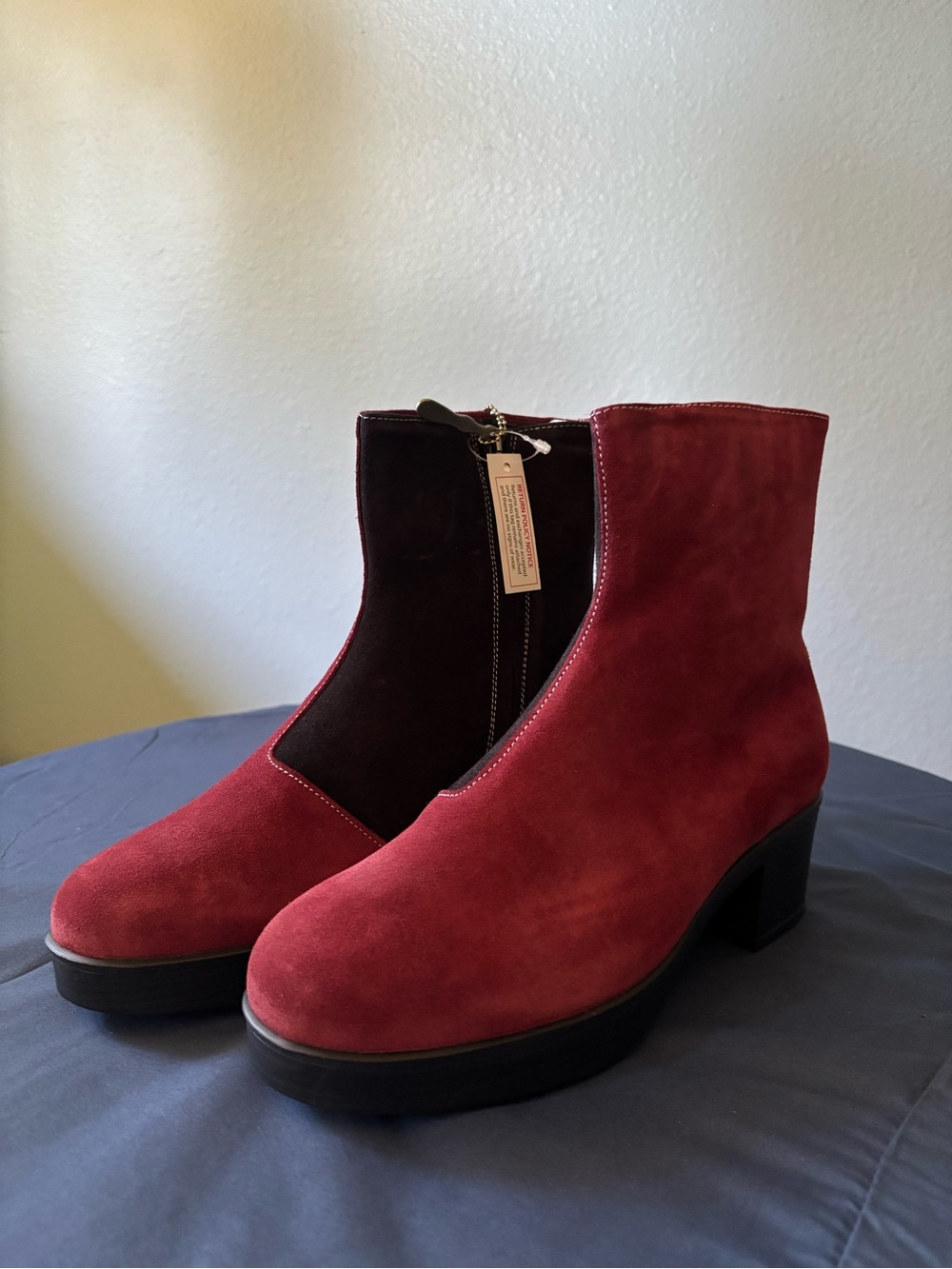 Lazo woman's red and black suede healed boots. NEW IN BOX!
